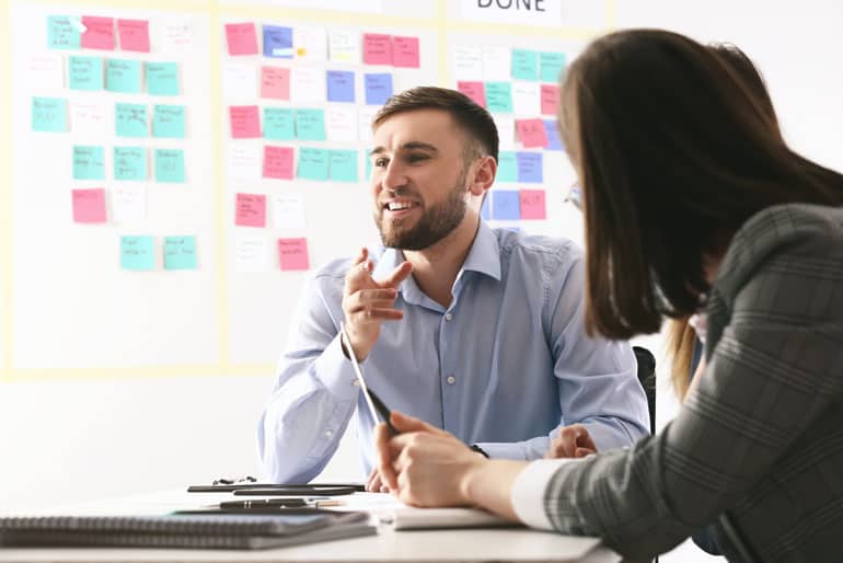 Project leader working with team on project lifecycle