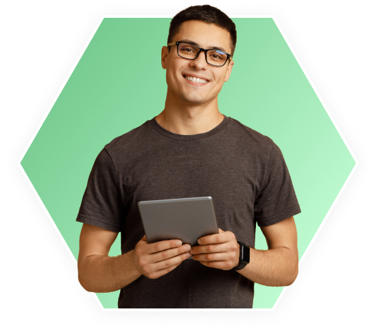Man with glasses holding tablet